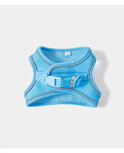 Blue breathable mesh pet vest harness with reflective trim and secure buckle detail view