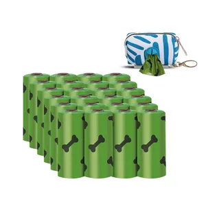 Detailed view of twenty green pet waste bag rolls featuring a patterned blue dispenser pouch.