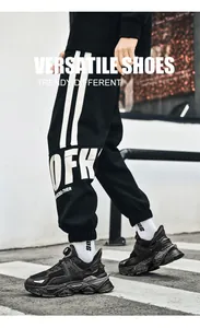 Breathable men's mesh sports sneakers featuring rotating buckle and chunky sole