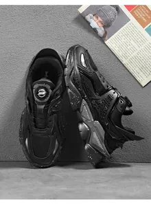 Detailed view of breathable mesh men's running shoes with mechanical rotary buckle