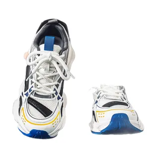 Retro chunky dad sneakers for men featuring white mesh with blue and yellow accents