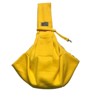 Solid yellow pet sling carrier with front pocket for small cats and dogs