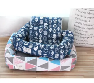 Detail view of thick breathable linen pet bed with reversible cat pattern cushion