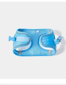 Detail view of blue breathable mesh dog harness with reflective strips and S size tag