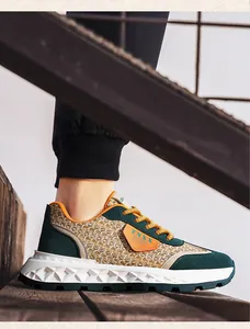 Close-up of men's casual sneakers featuring dark green suede and unique woven straw texture