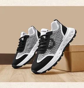 Detailed view of men's casual sneakers with woven texture and thick geometric sole