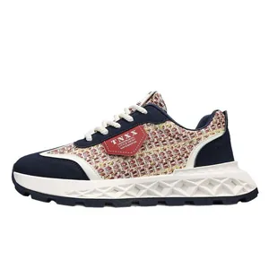 Vintage woven texture men's casual sneakers with navy suede overlays and thick soles.
