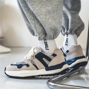 Japanese style retro sneakers with thick breathable soles and navy blue suede accents