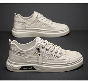 Detailed side view of breathable beige mesh casual sneakers for men with zipper