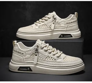 Side profile of off-white mesh men's streetwear sneakers with zipper and logo detail