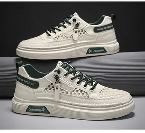 Close-up of breathable mesh men's sneakers in cream and green streetwear style