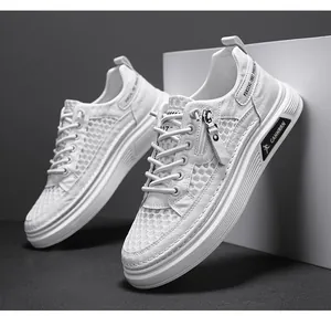 Detailed view of white mesh breathable sneakers for men with unique side zipper accent.