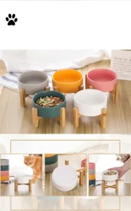 Detailed view of colorful ceramic cat bowls with elevated bamboo stands in various shades.