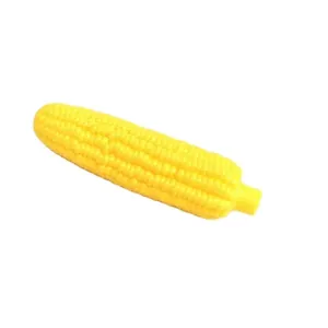 Detail view of a yellow corn-shaped squeaky dog toy for teething and cleaning
