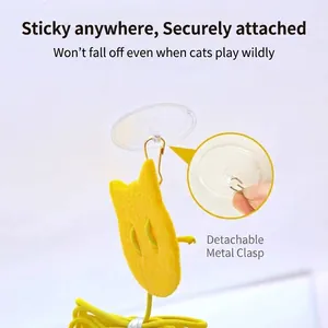 Hanging self-play cat toy featuring strong suction cup and elastic bungee rope for exercise