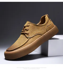 Detailansicht brauner perforierter Herren-Freizeitschuhe aus Leder mit dicker Sohle