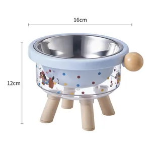 Elevated stainless steel pet bowl with cute cartoon print, 16cm width, wooden legs