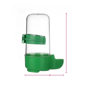 Detailed macro view of an automatic bird waterer featuring a clear bottle and green base