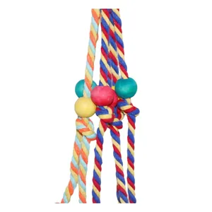 Close-up of durable colorful cotton rope and wooden beads for parrot bird toys.