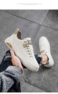 Detailed side view of stylish white sneakers with IMPALA logo and beige accents