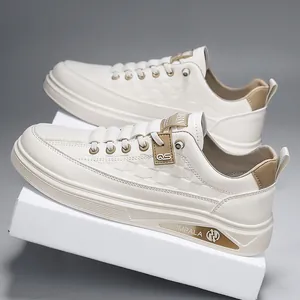 Stylish men's off-white casual sneakers featuring tan accents and a textured side panel.