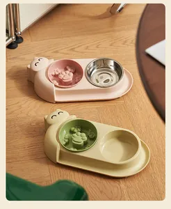 Detail of 15-degree tilted cat dual bowls with paw-print slow feeder insert