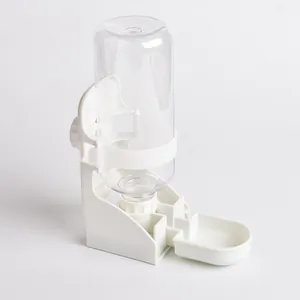 White automatic pet waterer with gravity feed and transparent bottle