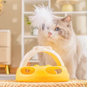 Gioco interattivo giallo per gatti con piuma a molla e palline interne