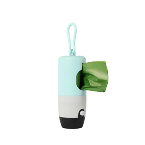 Detail of portable pet waste bag dispenser with LED light and hanging carabiner hook