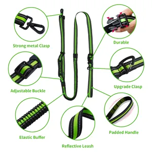 Reflective dog leash detail showing bungee buffer, metal clasp and padded handle.