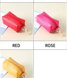 Mini portable pet waste bag dispensers in red, rose, and yellow with gold clips