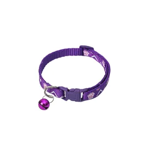 Purple pet collar with pink paw prints and a matching bell for cats and small dogs