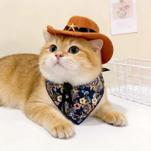 Schattige oranje cowboyhoed met gouden ster en bloemenbandana voor katten accessoires