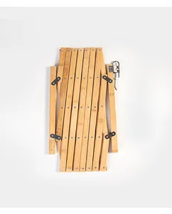 Compact folded view of the portable bamboo pet safety gate designed for easy storage