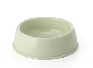 Close-up detail view of a durable pale green thickened pet food bowl for dogs and cats