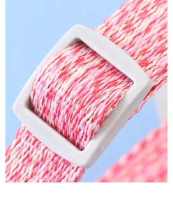Close-up of durable pink braided rope and adjustable grey buckle on the pet dog leash.