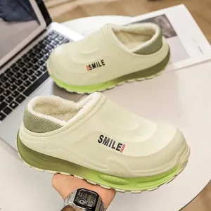 Warm fleece-lined winter clogs with non-slip sole and smile sport design