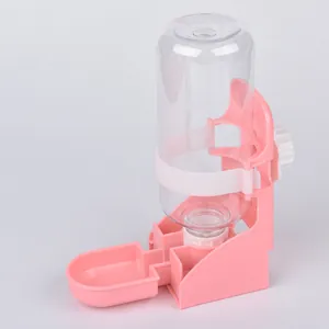 Pink pet water dispenser with a transparent bottle and cage mounting knob for small animals
