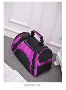 Detailed side view of the breathable mesh pet carrier bag in purple and black colors