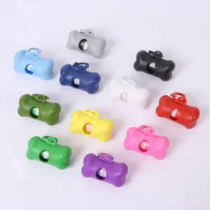Detailed view of bone-shaped portable pet waste bag dispensers in various vibrant colors.