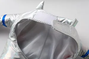 Close-up of the white hook-and-loop fastener on the silver astronaut dog costume