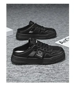 Detailed side view of black mesh backless platform sneakers with fashion tag decoration.