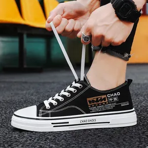Men's fashionable black low-top canvas sneakers with casual style and durable rubber sole