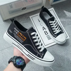 Stylish black low-top platform canvas sneakers for men featuring unique graphic prints