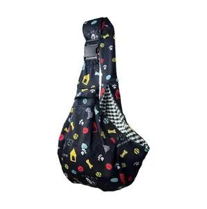 Detail of pet sling bag with adjustable buckle and colorful puppy pattern