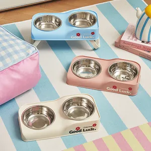 Elevated and foldable stainless steel double pet bowls for dogs and cats in pastel colors