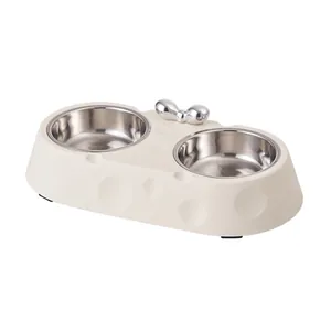 Modern pet double feeding bowl with stainless steel inserts and cheese pattern base