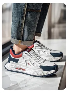 Side view of tricolor breathable chunky sneakers for men in white, blue, and red