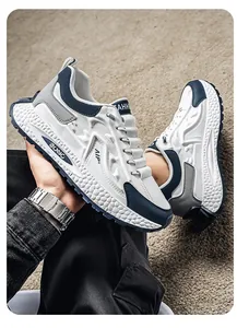 Detail view of men's breathable patchwork sports shoes with thick textured sole