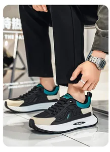 Detailed view of men's color-block breathable sneakers with textured white sole